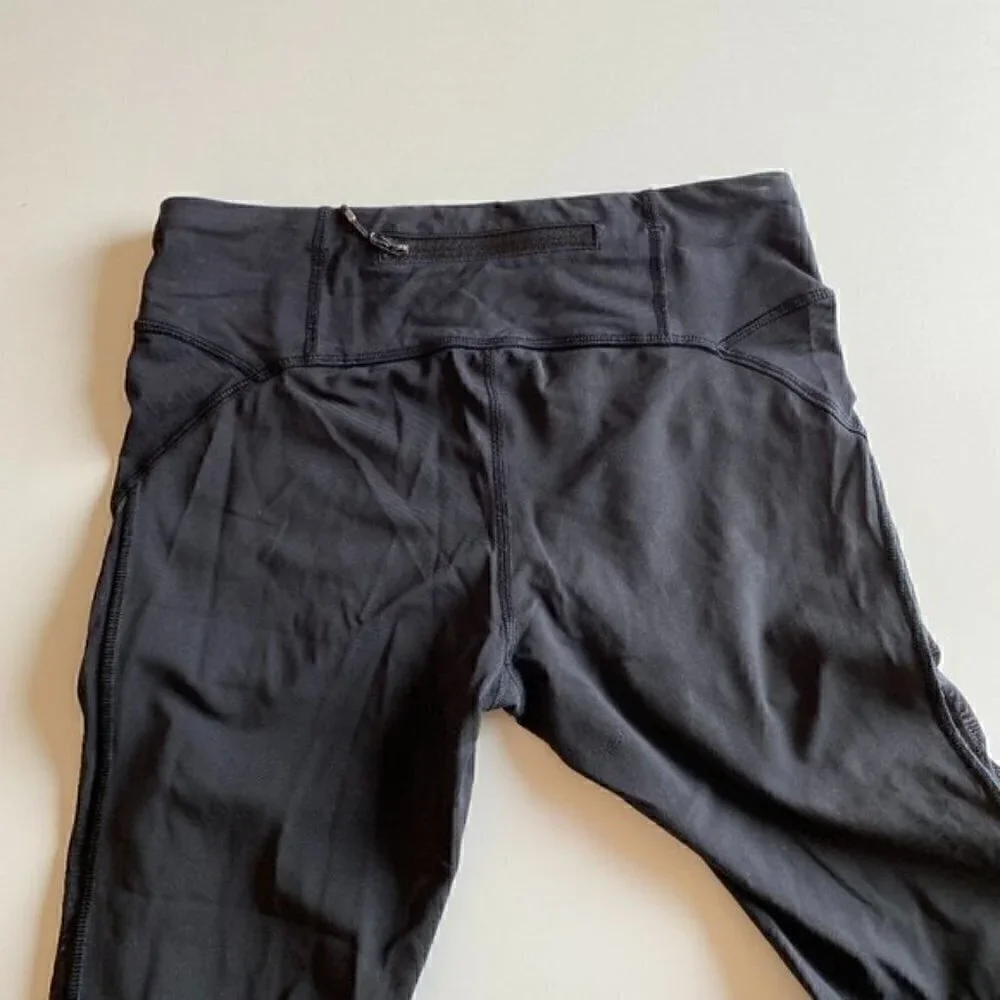 Lululemon Black Crops with Mesh Side Panel Size 6
